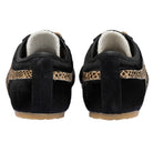 black hair snake skin detail sneaker