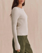beige long sleeve sweater with pointelle details