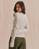 beige long sleeve sweater with pointelle details