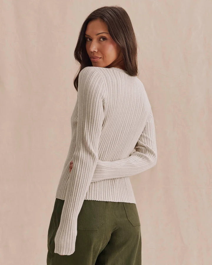 beige long sleeve sweater with pointelle details