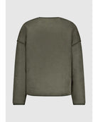 green suede jacket with plaid on the side that is reversible