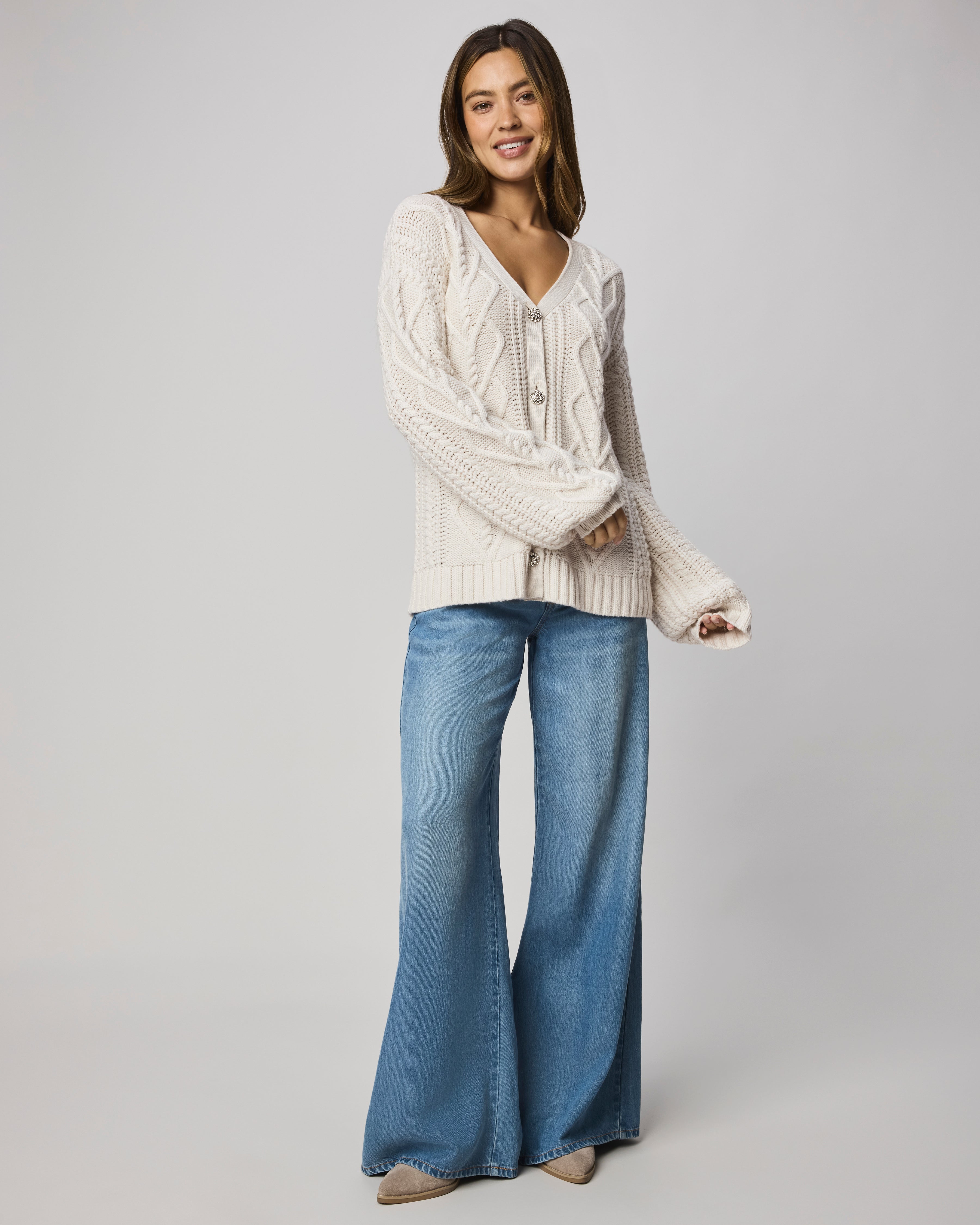 cream cable knit cardigan with silver buttons