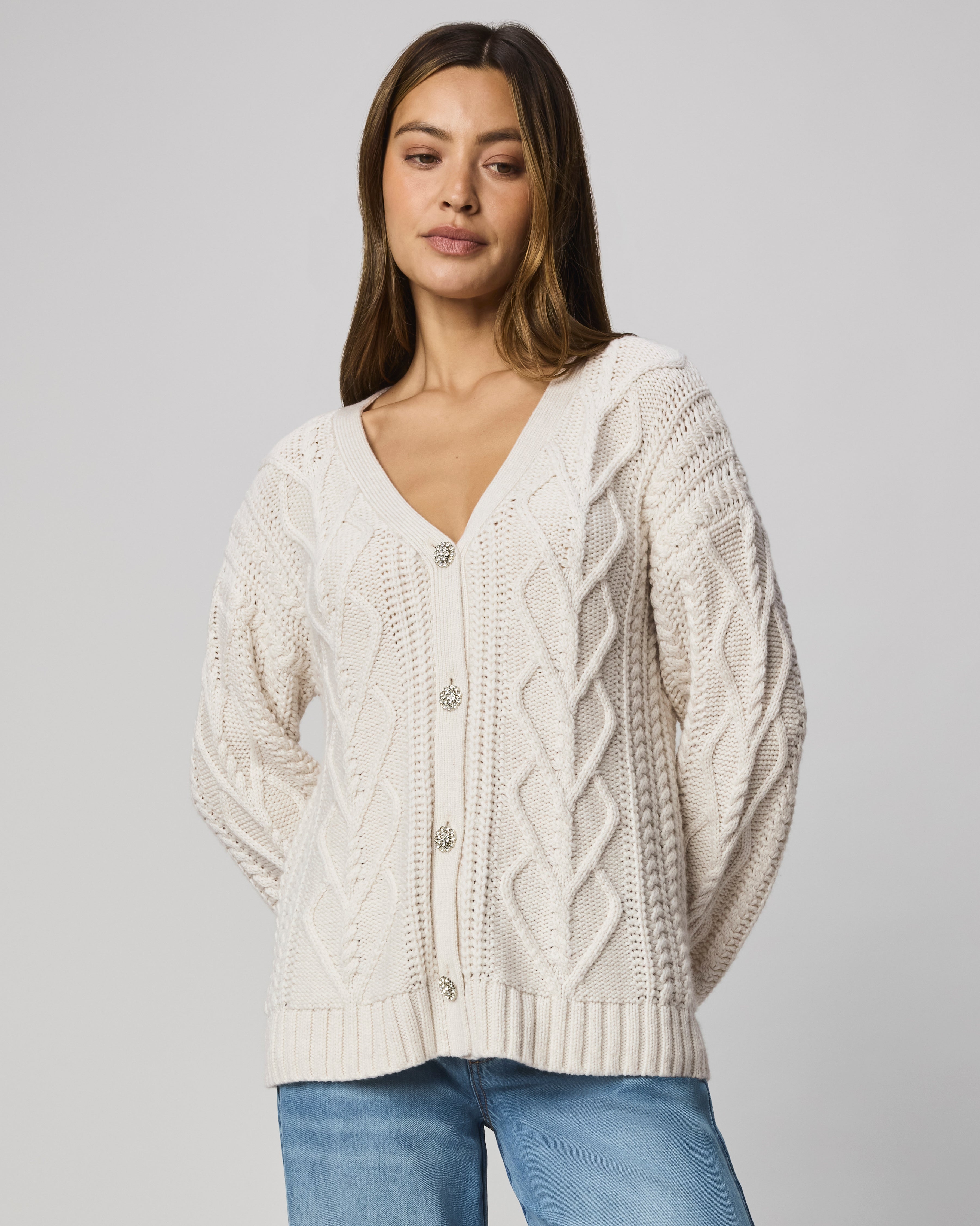 cream cable knit cardigan with silver buttons