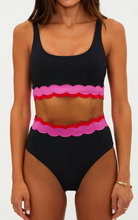 bikini bottom in black with pink and red on the top