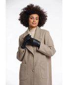 faux leather gloves in black with a gold buckle at wrist