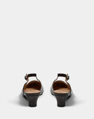 black leather stiletto sling backs