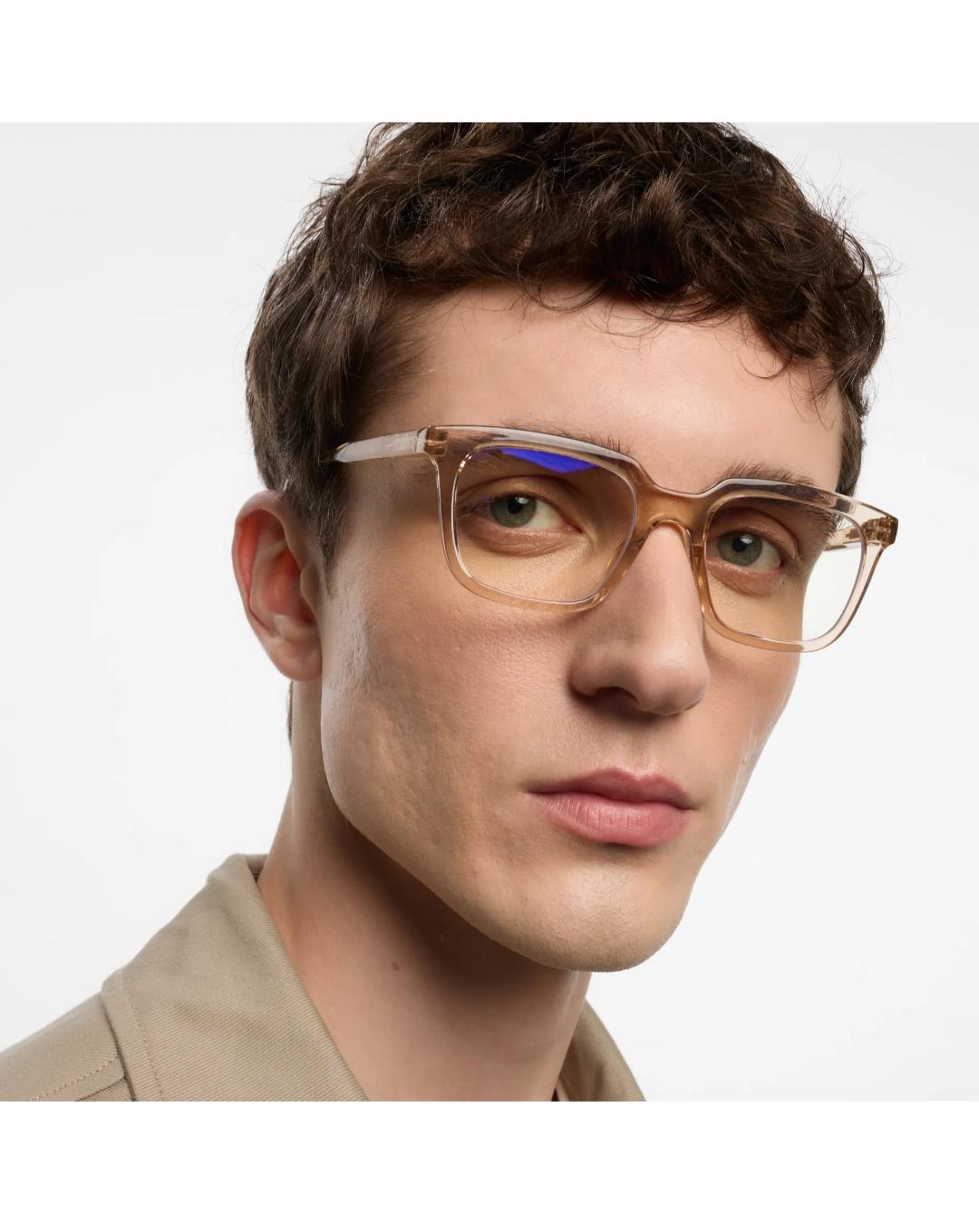 eye glasses with a light pink frame