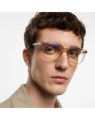 eye glasses with a light pink frame