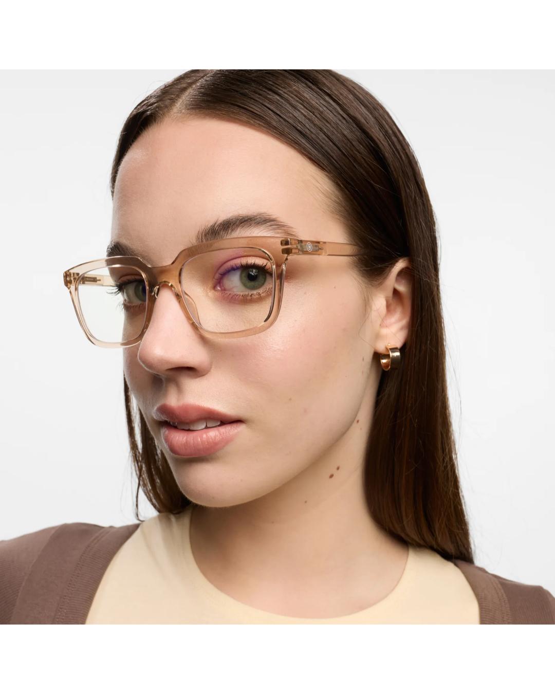 eye glasses with a light pink frame