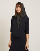 black wool sweater with short sleeves