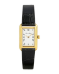 wrist watch with a black leather strap and gold and white face
