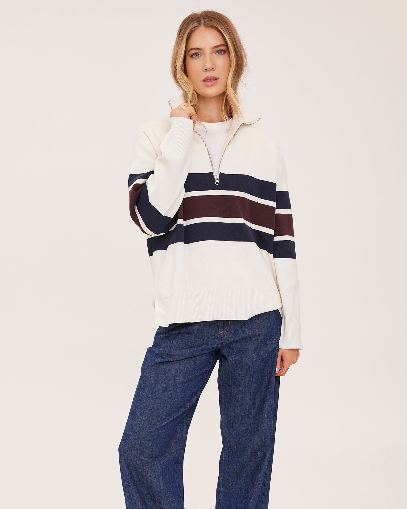 cream half zip sweater with navy and burgundry stripe