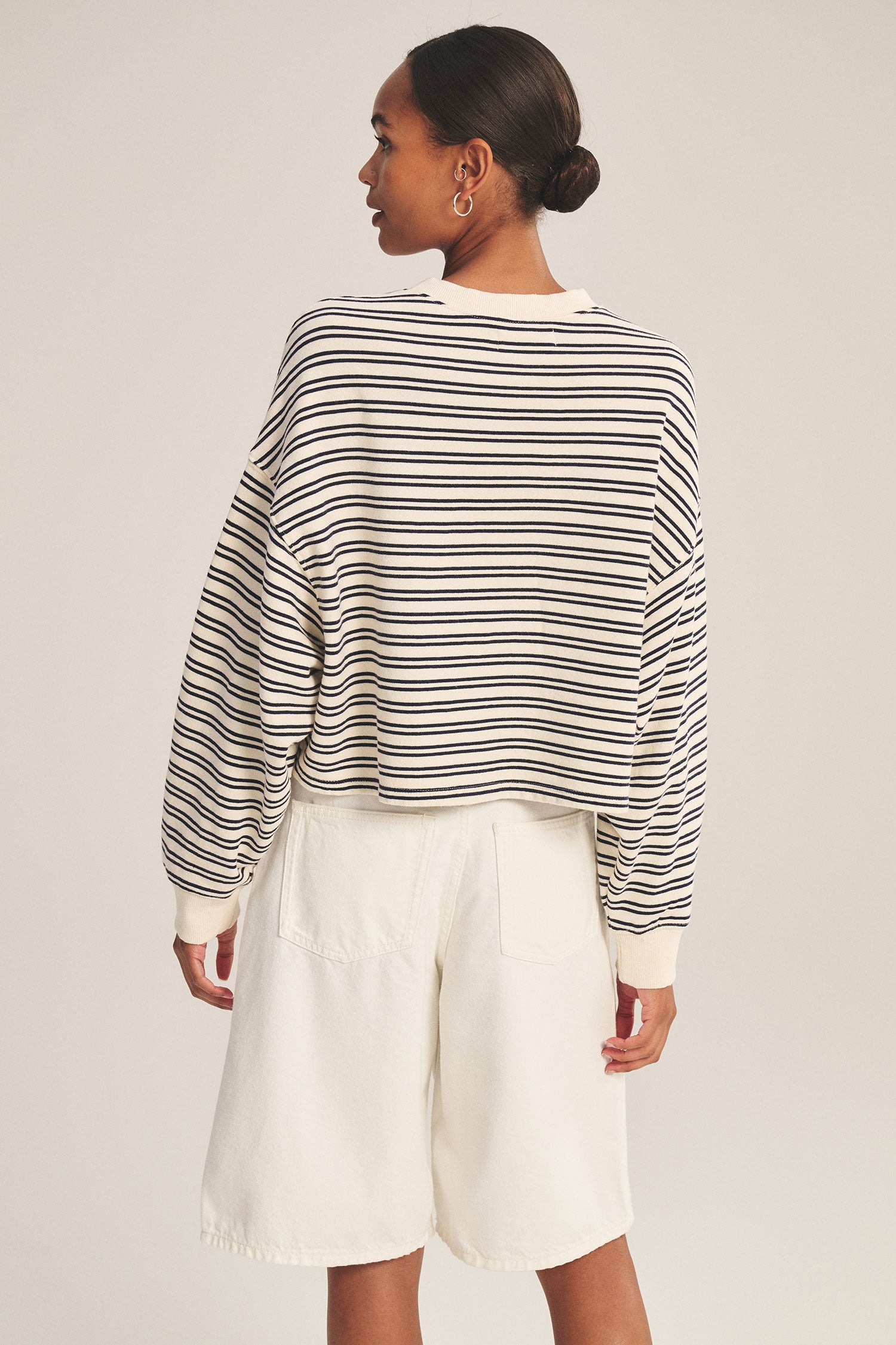long sleeve crewneck sweater with cream and navy stripes