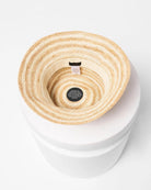 straw bucket hat with a dark beige and light beige stripe