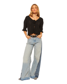 black knit short sleeve top with knit rose in the middle 