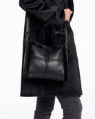 large black and fur purse