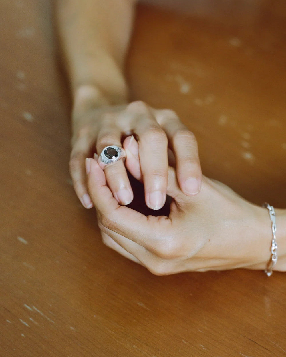 silver ring with quartz in the middle