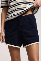 navy crochet shorts with a cream trim