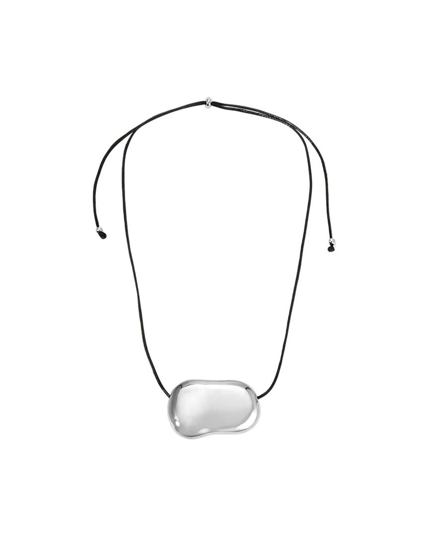 black rope necklace with statement solver pendent