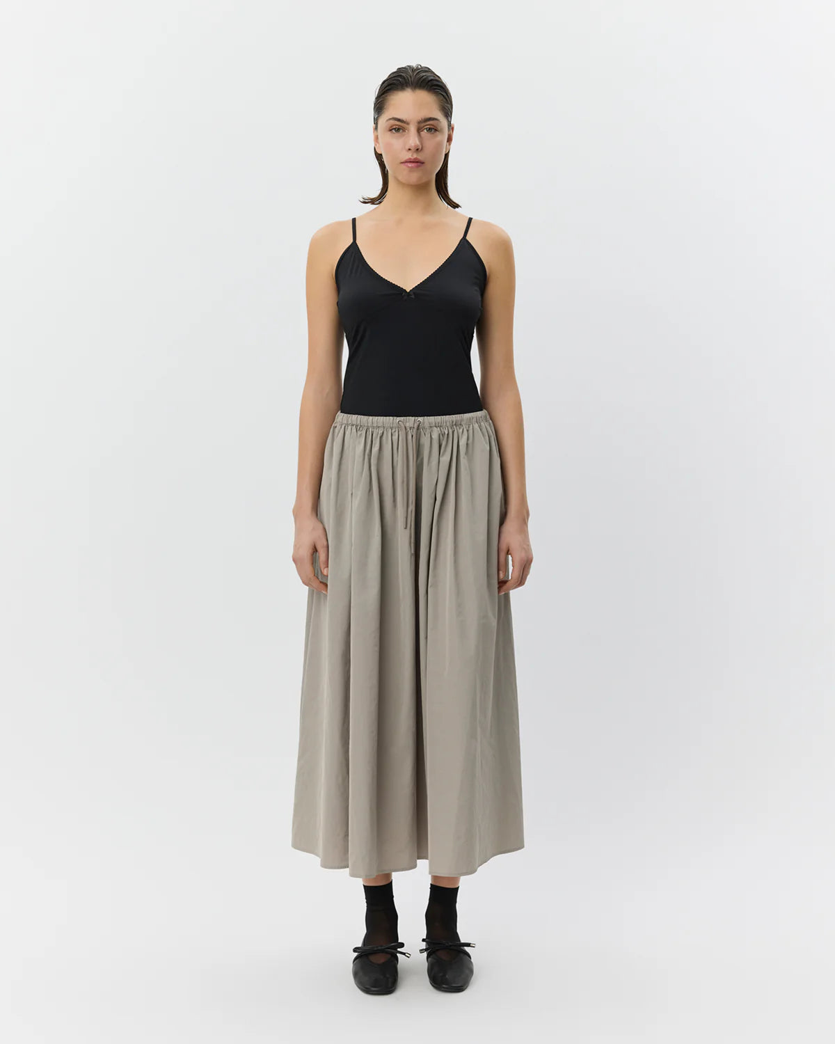 midi a line skirt in a light khaki green