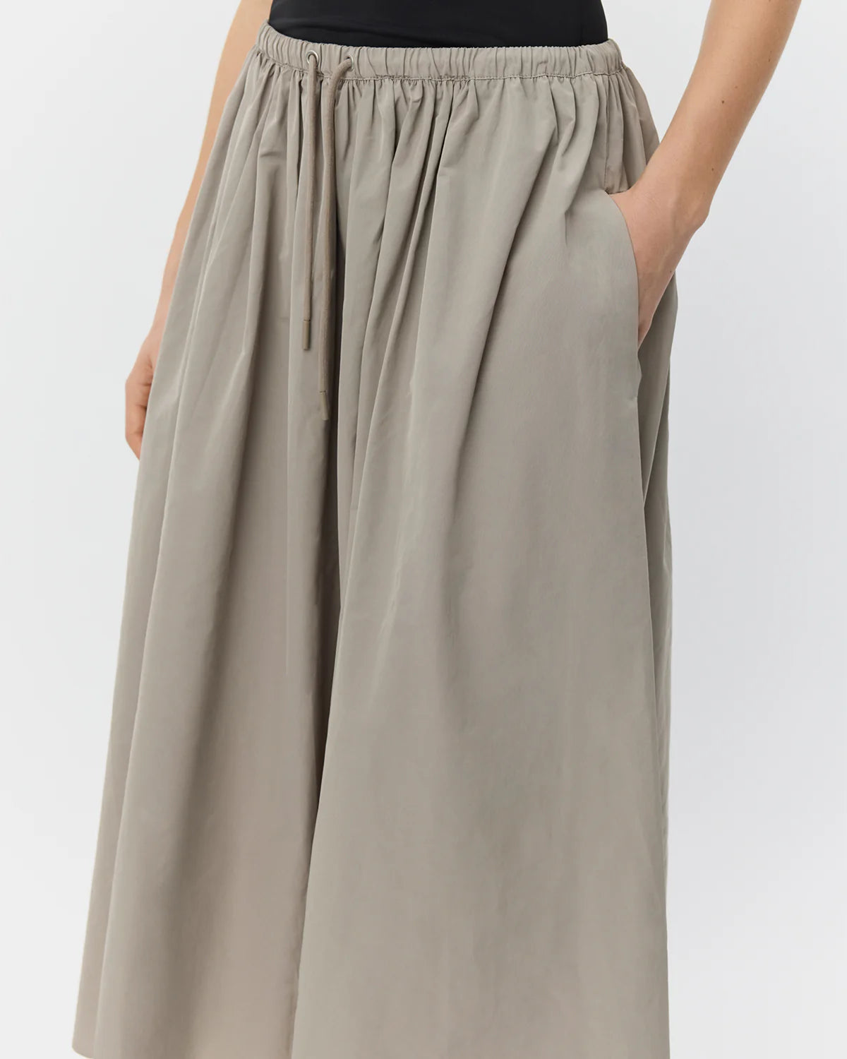 midi a line skirt in a light khaki green