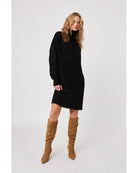 sweater dress in black with a turtleneck