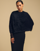black fuzzy poncho