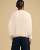 cream fuzzy poncho