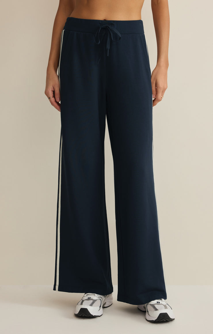 wide leg lounge pant in navy with a white stripe down the side