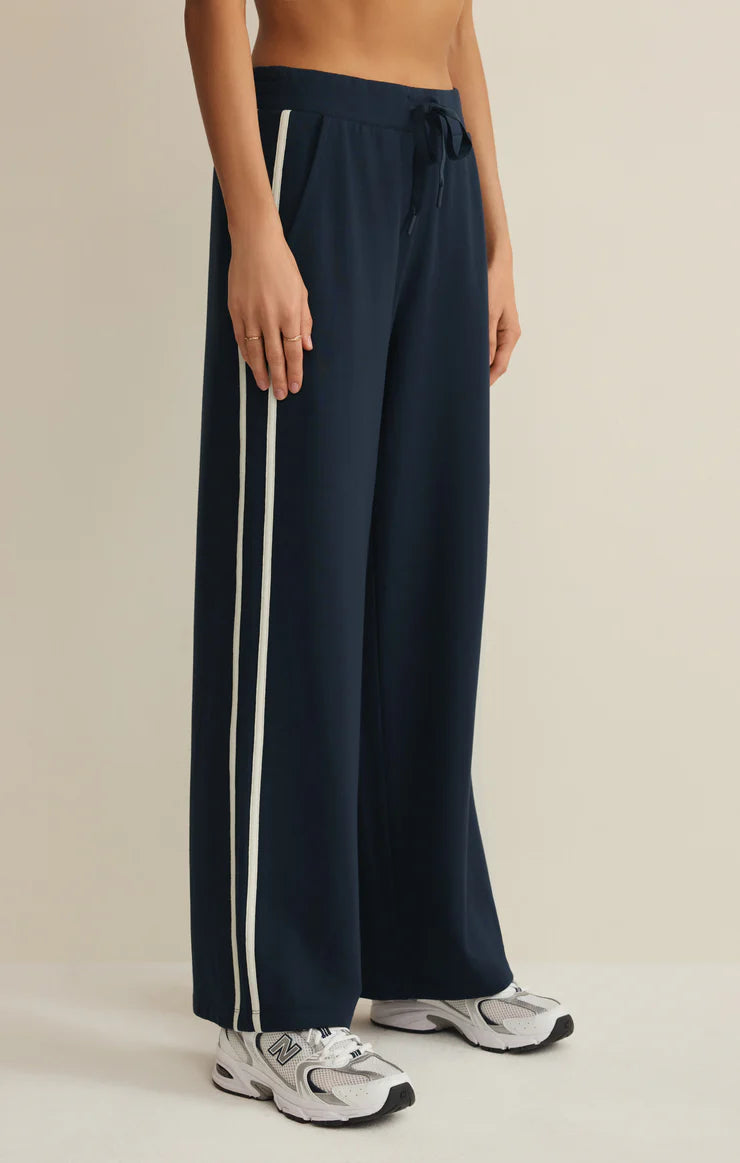 wide leg lounge pant in navy with a white stripe down the side