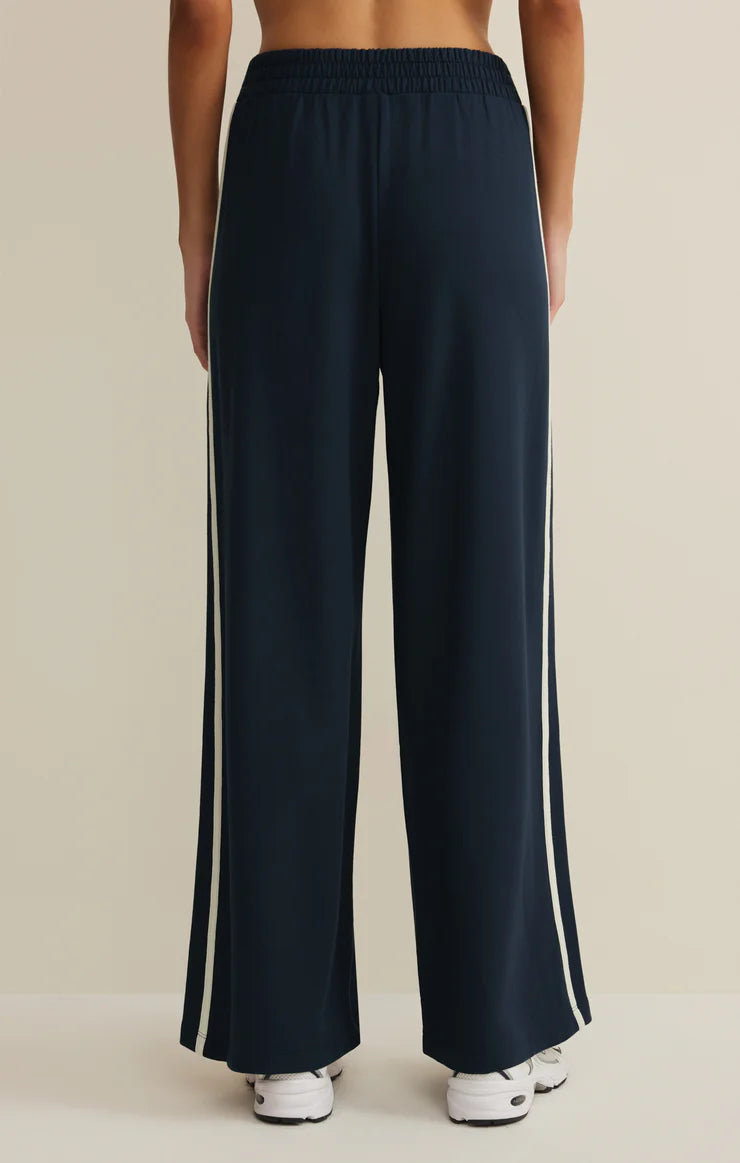 wide leg lounge pant in navy with a white stripe down the side