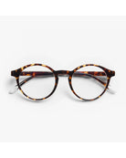 round eyeglasses with a tortoise frame