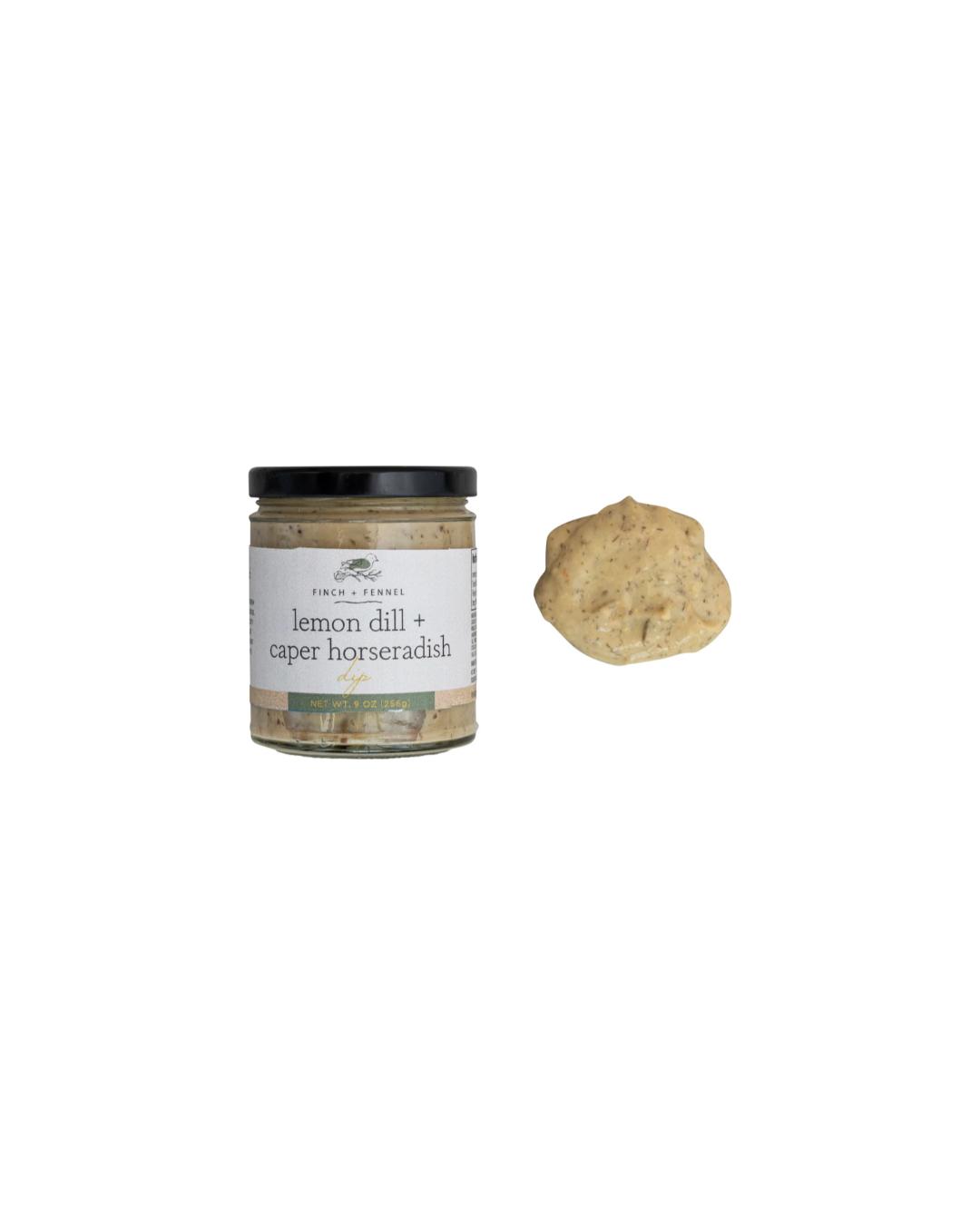 Jar of lemon dill and caper horseradish with a sample on a white background