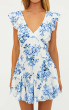 white mini dress with blue floral prints