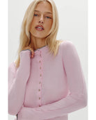 pink button up cardigan with grey on the top and bottom