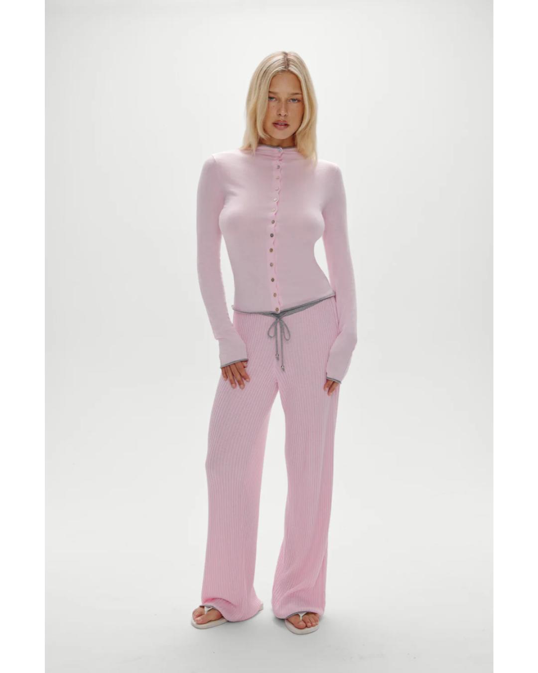 pink button up cardigan with grey on the top and bottom