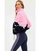 sherpa half zip sweater with mountain peaks in navy and pink