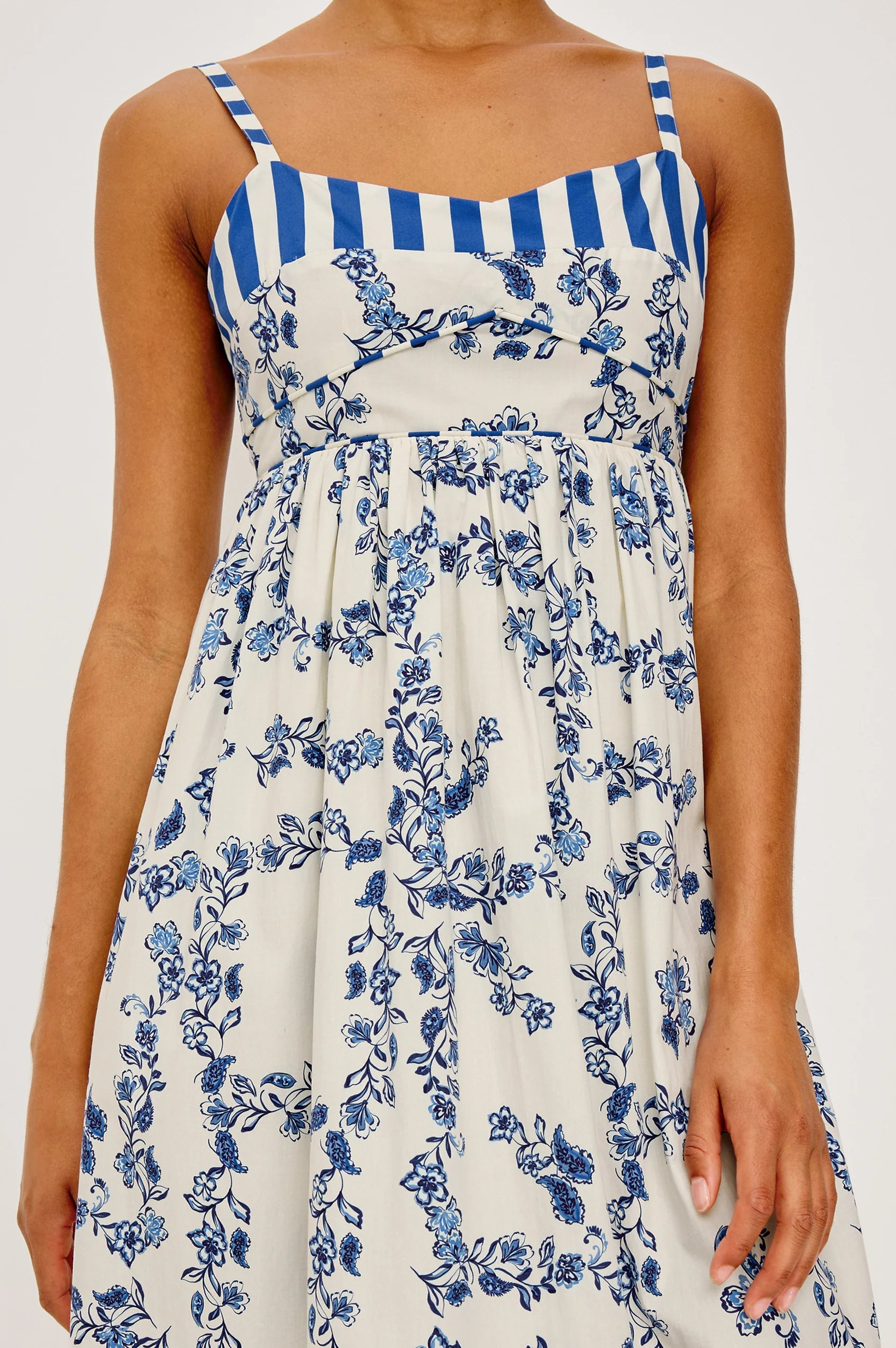 blue floral maxi dress with oranges on bottom