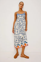 blue floral maxi dress with oranges on bottom
