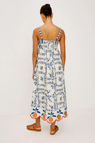 blue floral maxi dress with oranges on bottom