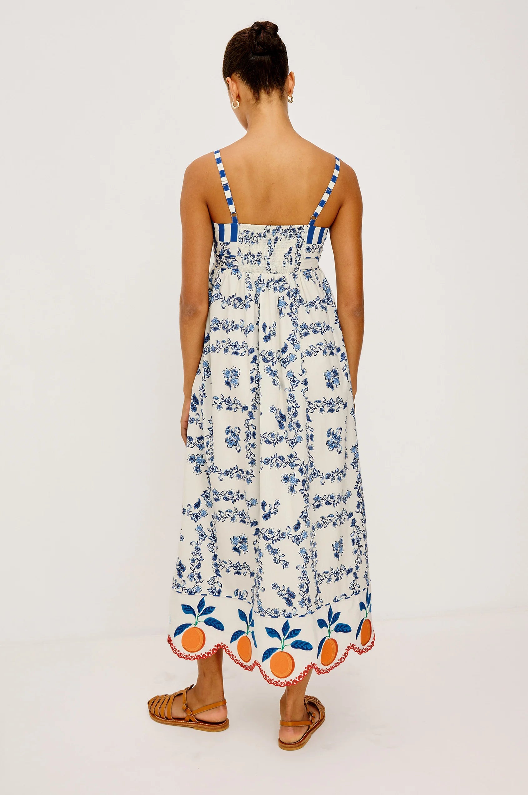 blue floral maxi dress with oranges on bottom