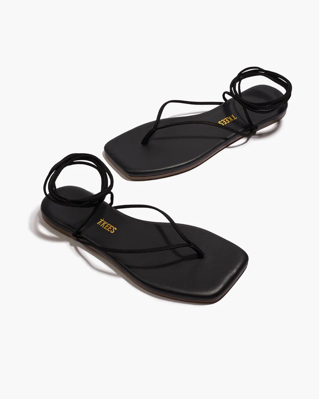 black sandal that wraps around the ankle