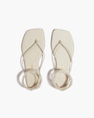 cream sandal that tie around the ankle