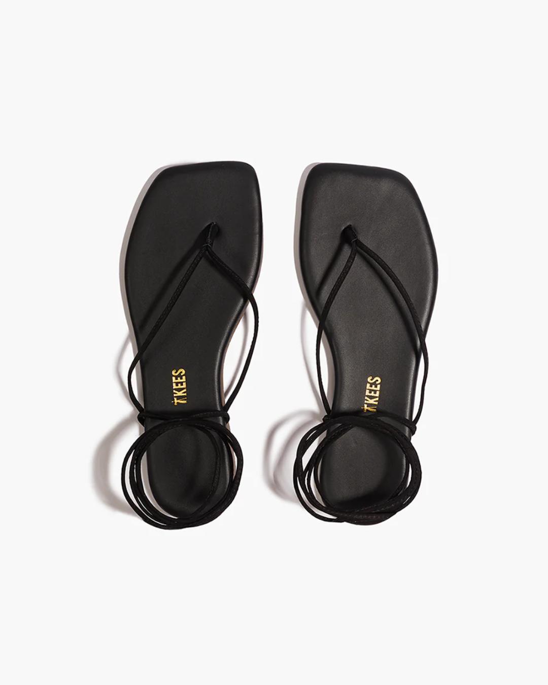 black sandals that tie around the ankles