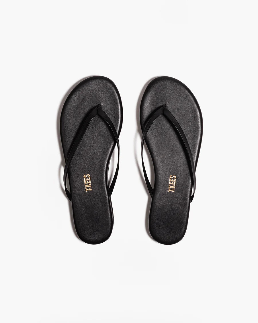black flip flop with a platform