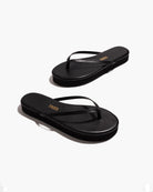 black flip flop with a platform