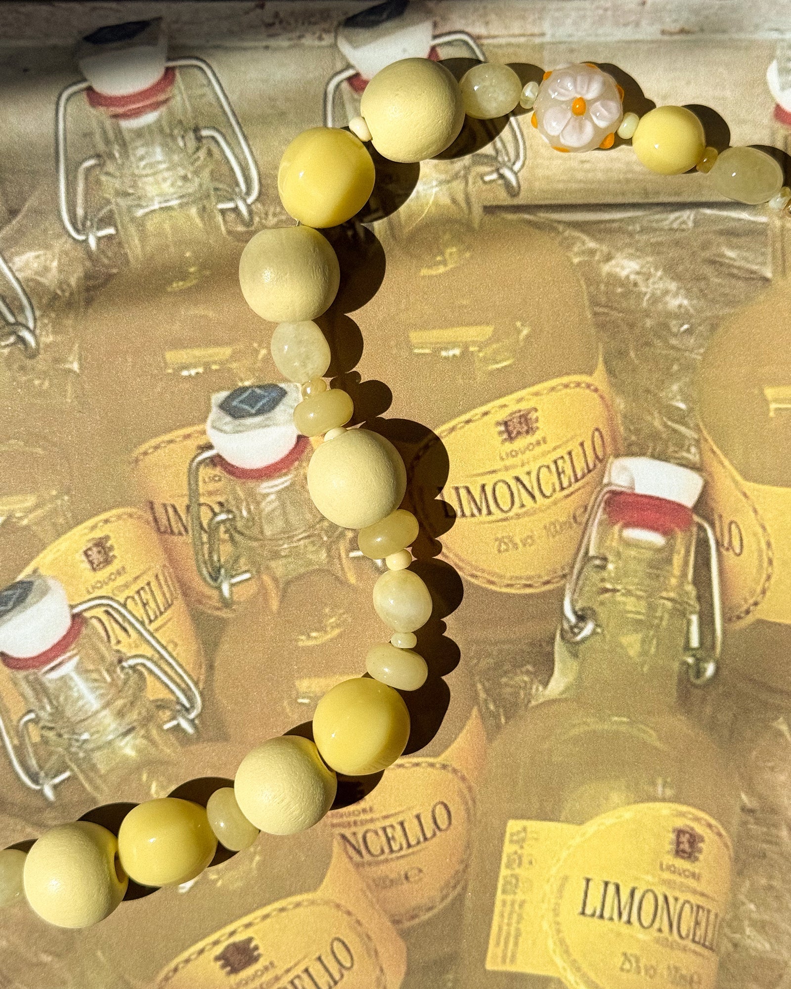 yellow beaded phone wristlet 
