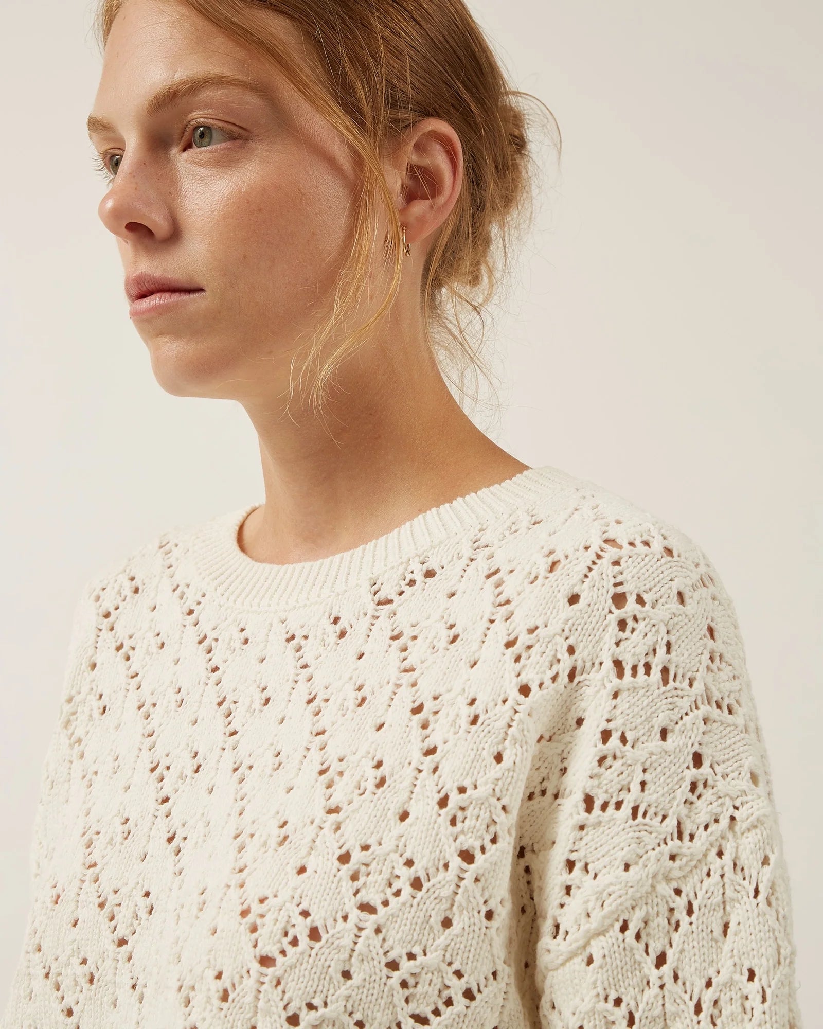 white crochet sweater