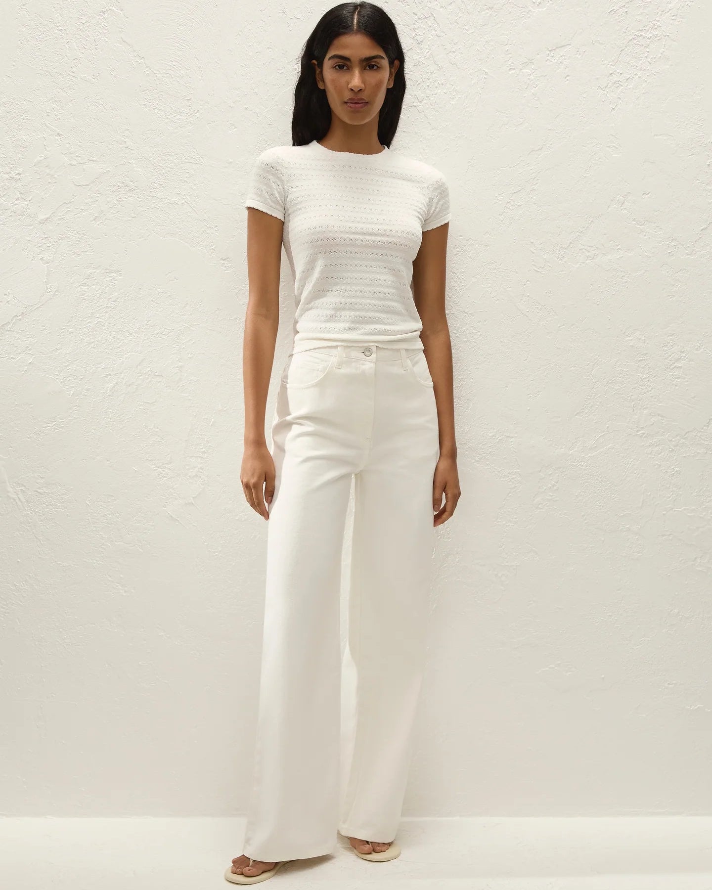 white short sleeve top with a pointelle print