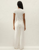 white short sleeve top with a pointelle print